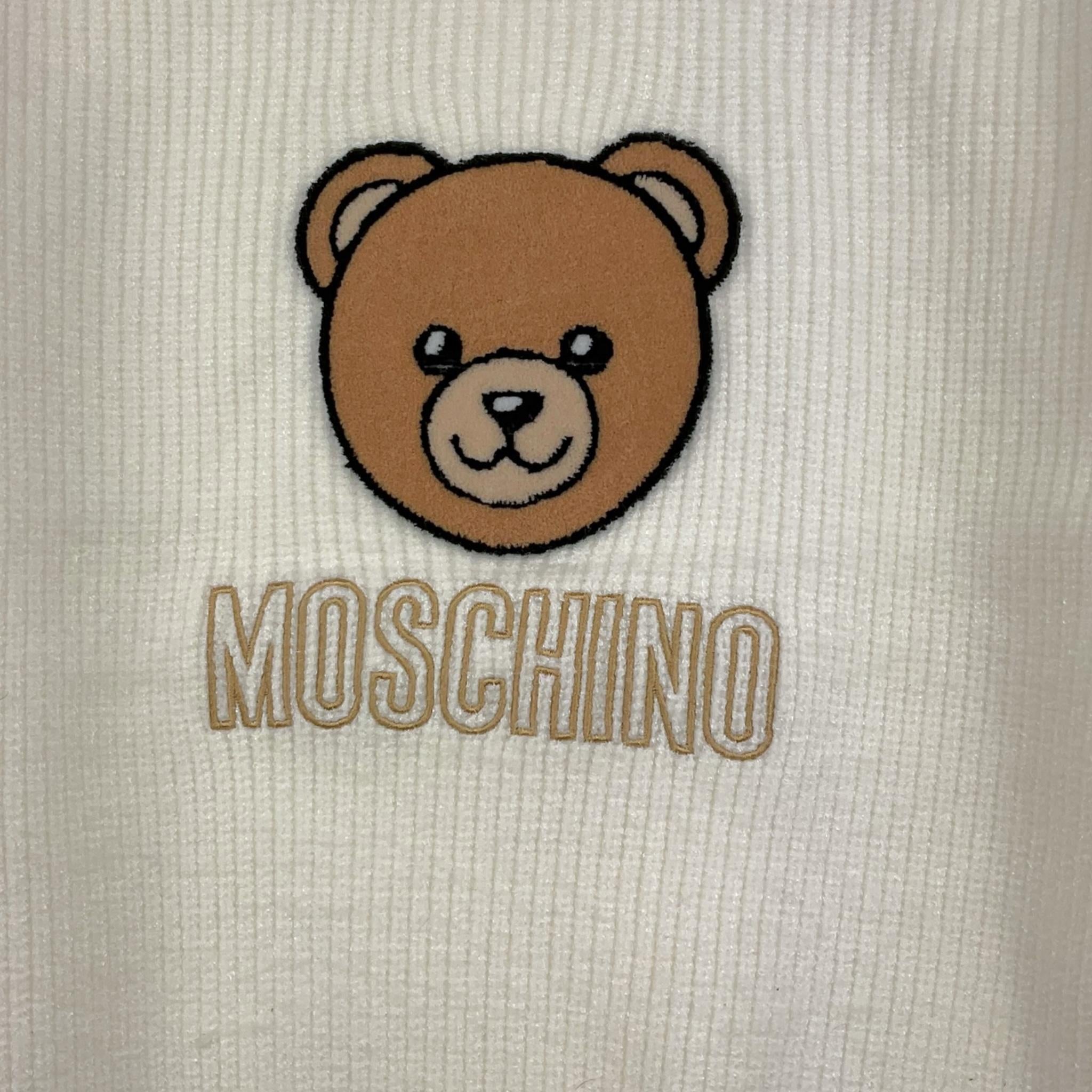 MOSCHINO maglia tinta unita collo alto con stampa Bianco per Bambina HDW02A BIANCO MOSCHINO