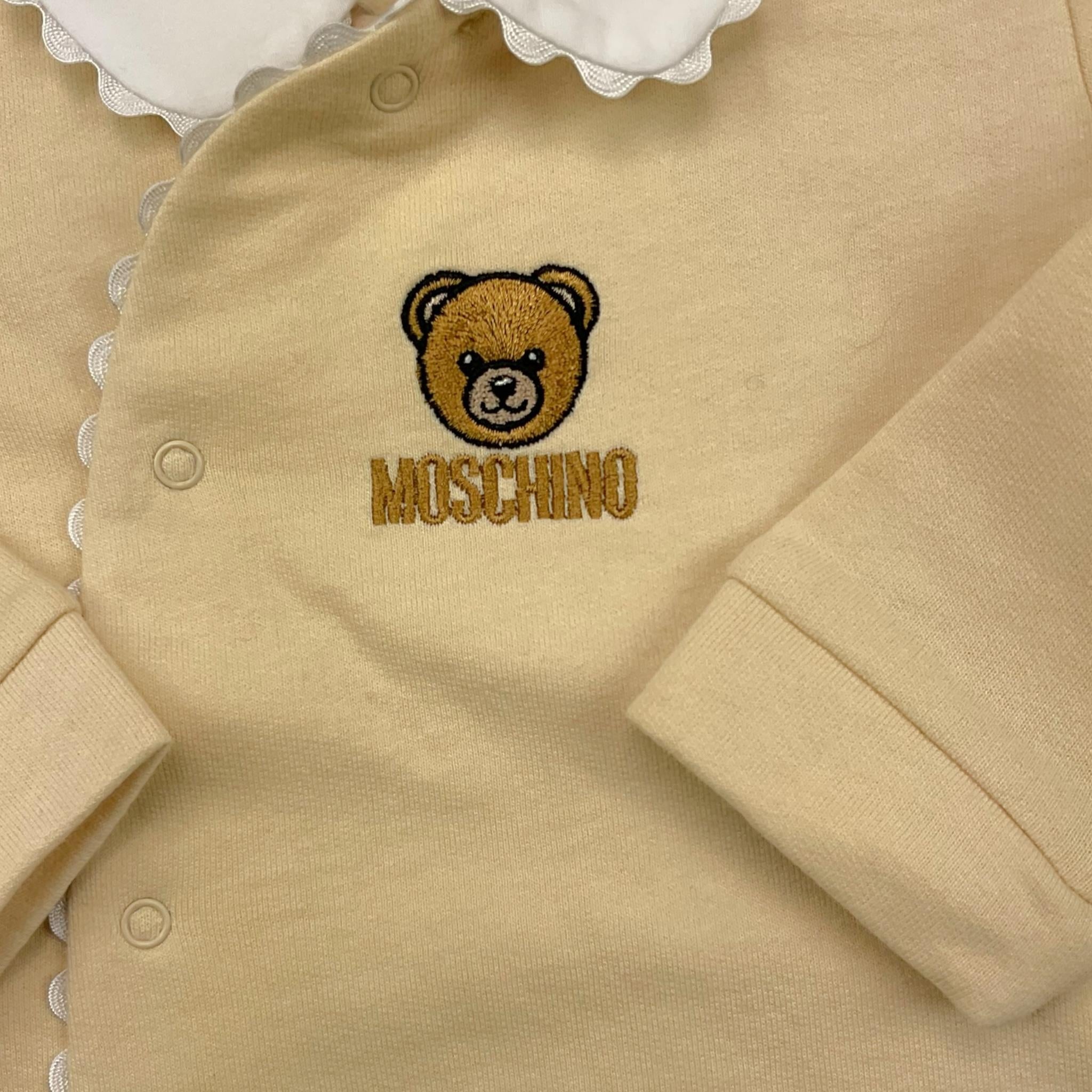 MOSCHINO tutina tinta unita con stampa Beige per Neonata MUY08G BEIGE MOSCHINO