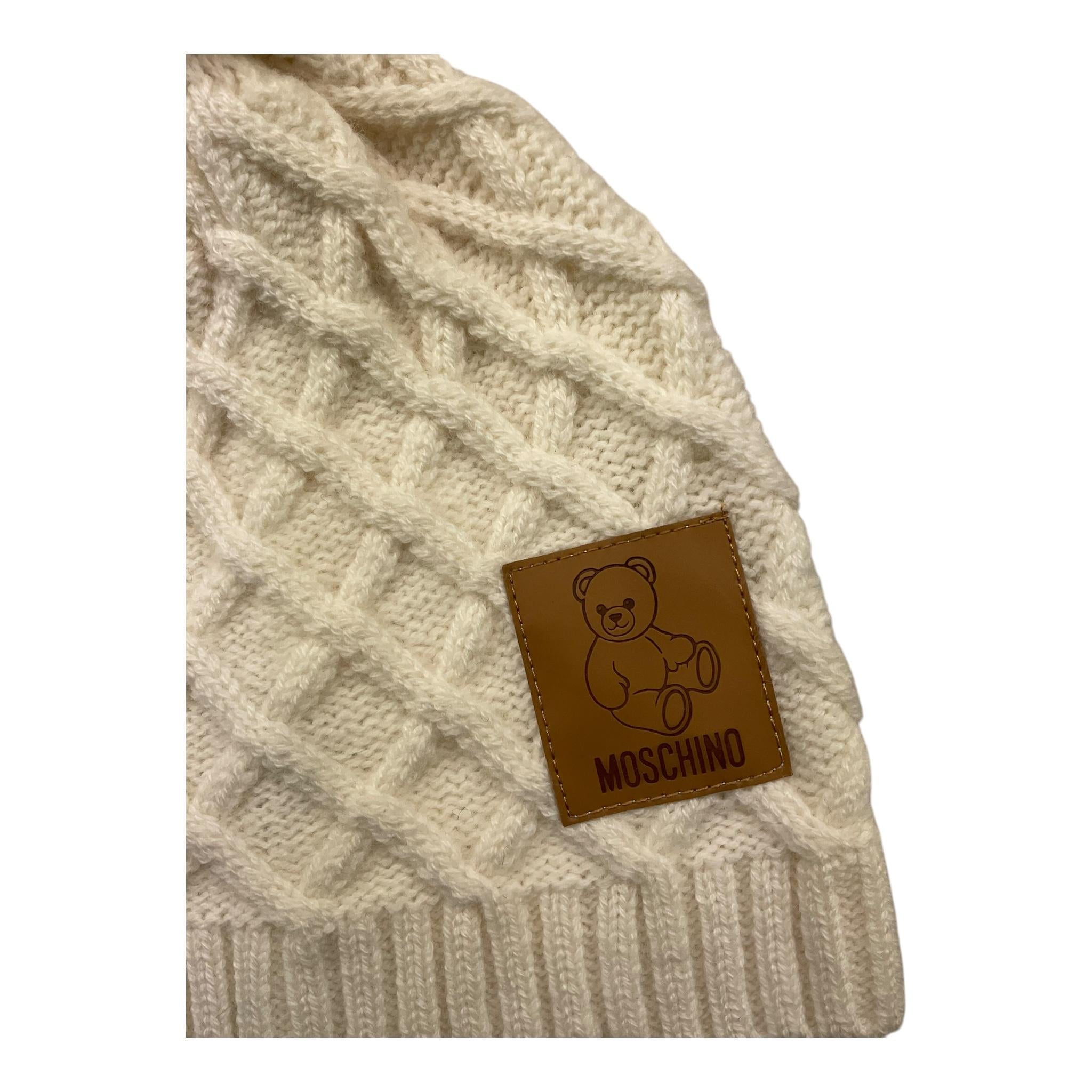 MOSCHINO cappello tinta unita con pn pon Panna per Neonato MUX05J PANNA MOSCHINO