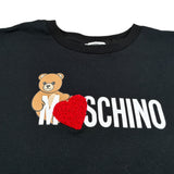 Moschino T-Shirt Girocollo tinta unita con Stampa Nero per Bambina H1M060 NERO MOSCHINO 
