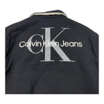CALVIN KLEIN giubbino tinta unita con colletto e bottoni e logo reversibile Nero/beige per Bambino I0IU00541 NERO/BEIGE CALVIN KLEIN 