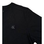 Calvin Klein T-Shirt Girocollo tinta unita con Logo Nero per Bambino IU0IU00543X NERO CALVIN KLEIN 