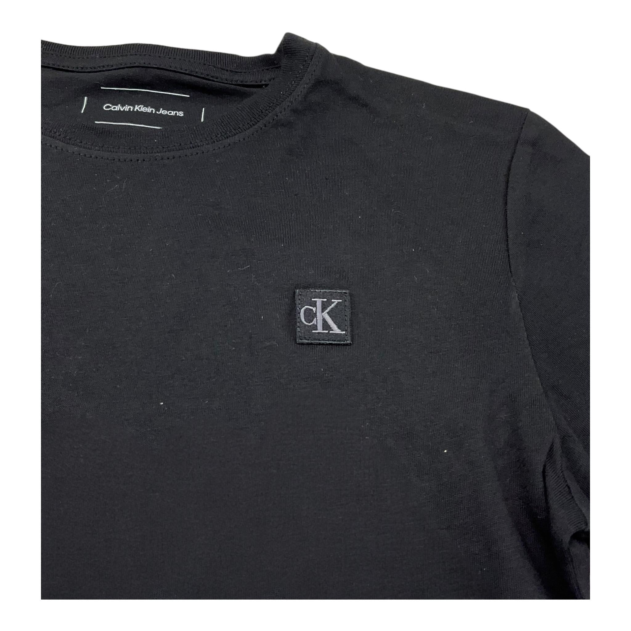 Calvin Klein T-Shirt Girocollo Tinta Unita con Logo per Bambino U00543J NERO CALVIN KLEIN 